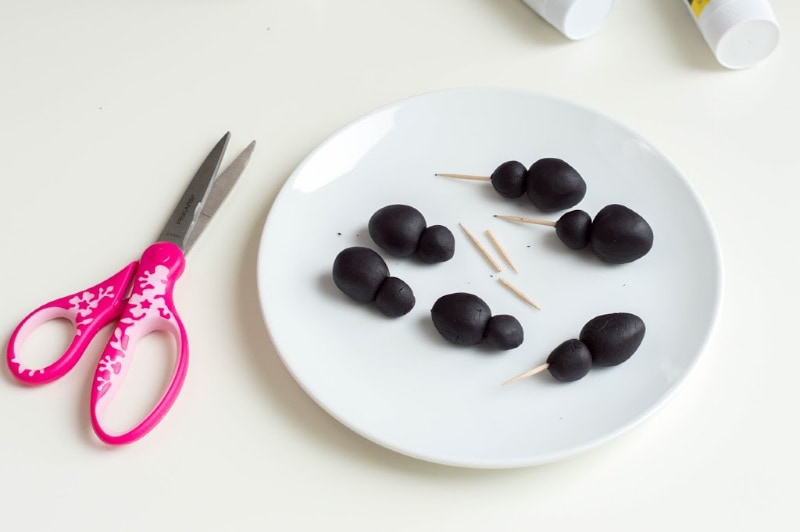 plates with black fondant and scissors