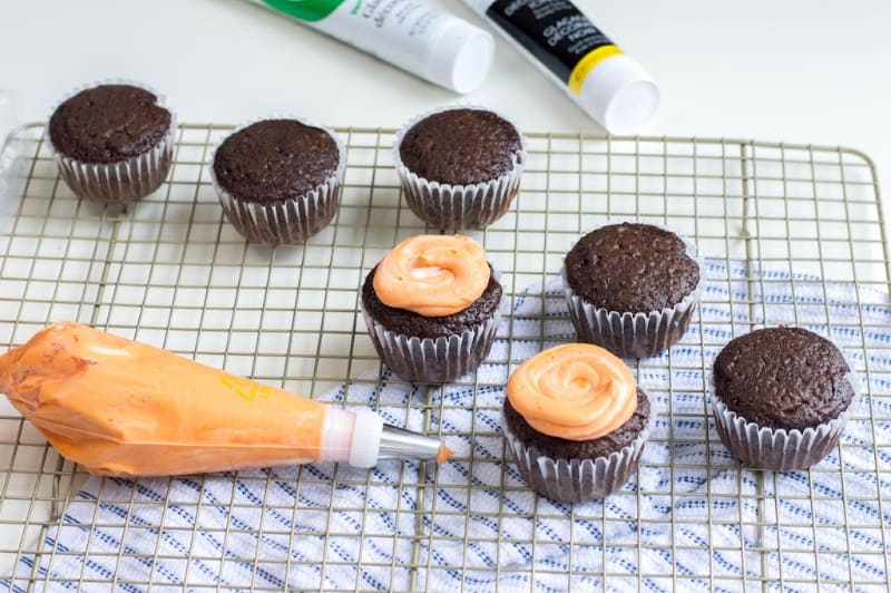 cupcakes with orange frosting