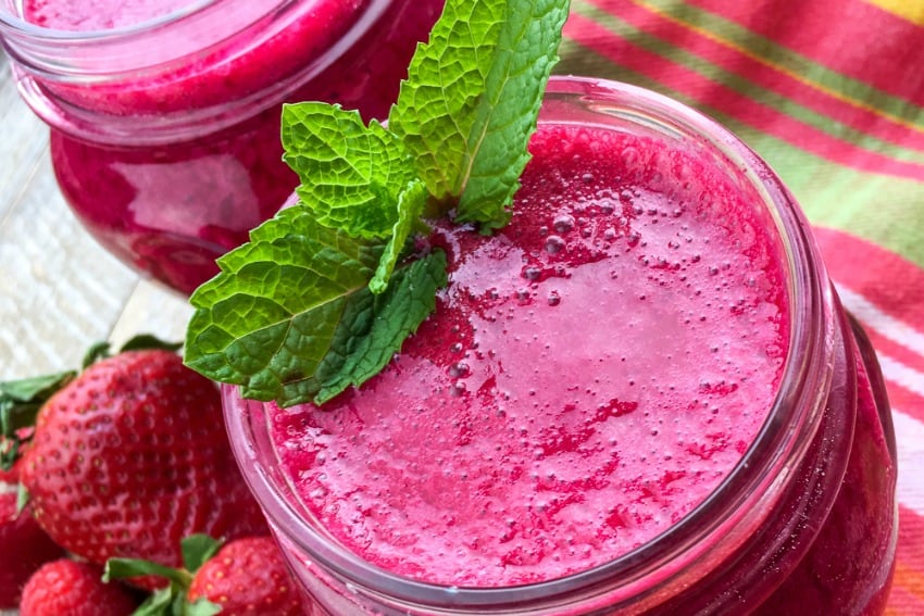 our easy-to-make berry beet smoothie served in mason jars