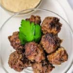 Meatballs in a bowl with Swedish Meatball Gravy on the side