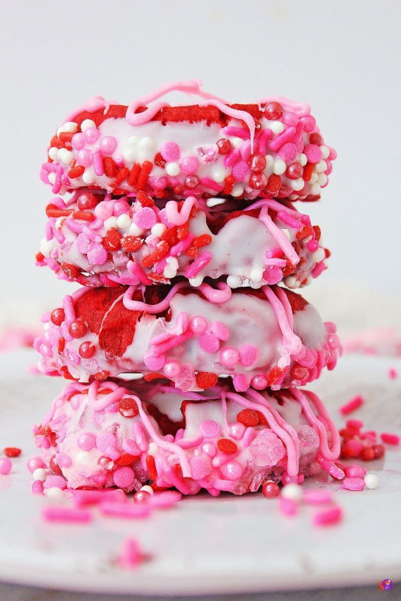 Valentine Thumbprint Cookies stacked on plate