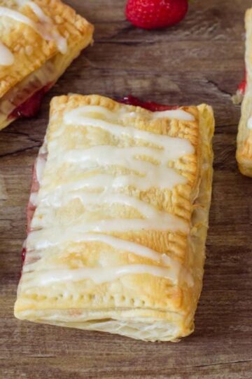 Puff Pastry Strawberry Strudel on table.