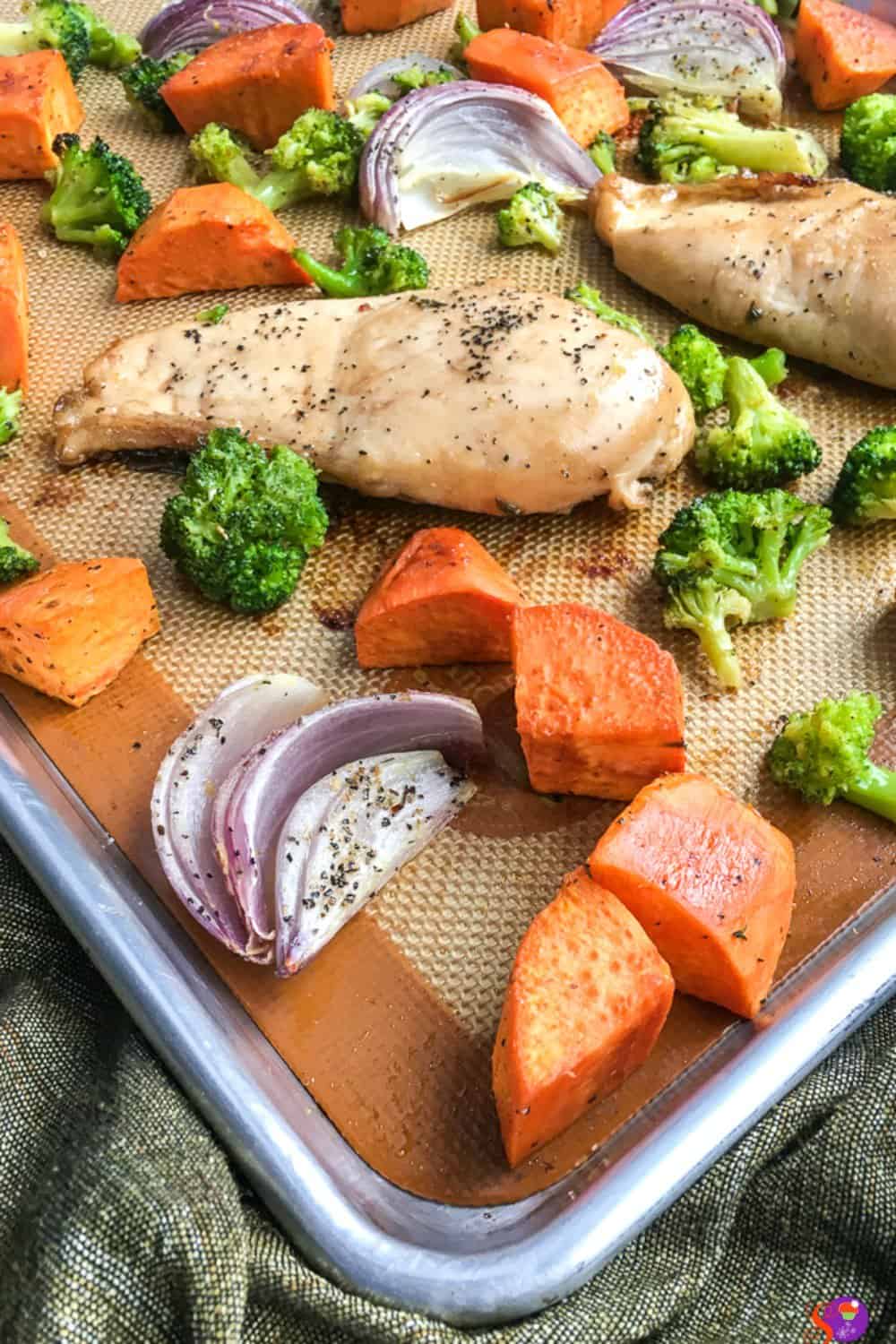 This delicious one-sheet dinner combines sweet potatoes, broccoli, red onion, carrots, and chicken breasts with a slightly sweet homemade balsamic marinade that practically begs to be eaten!