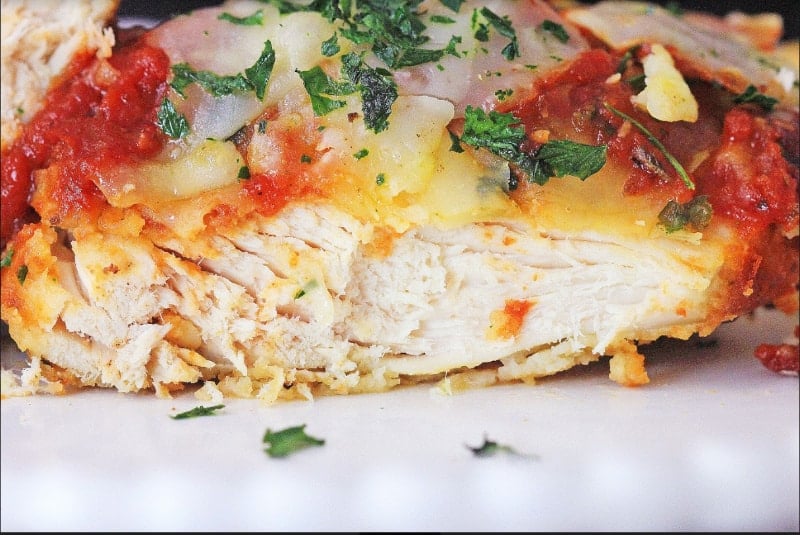 Air Fryer Chicken Parmesan Chicken Parmesan cut on a plate