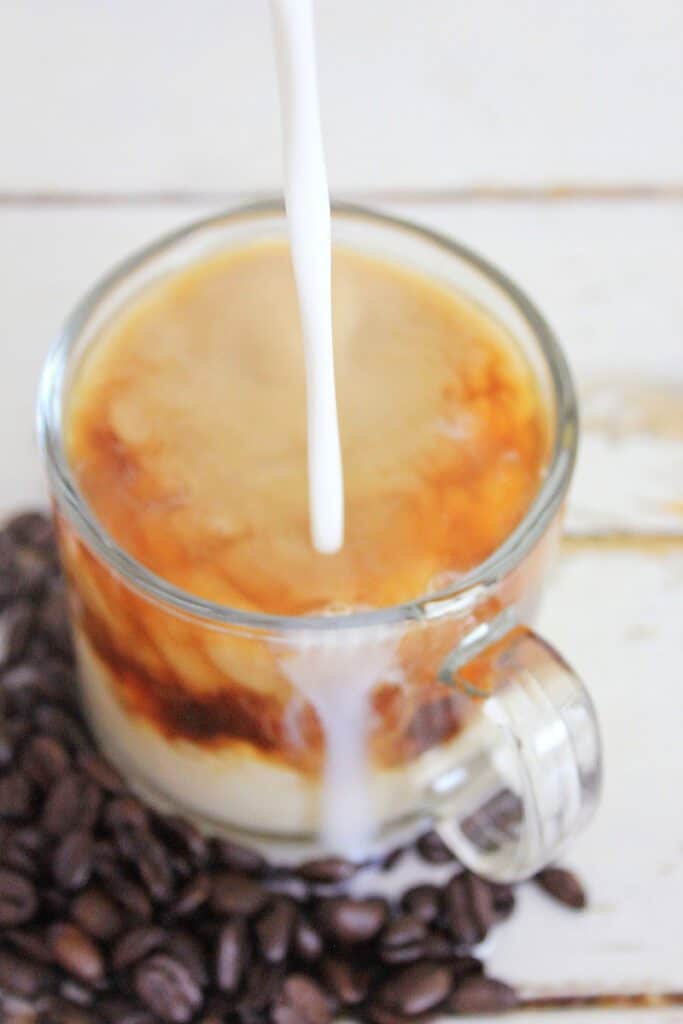 Toasted Coconut Honey Latte milk being poured into Toasted Coconut Honey Latte