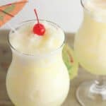 frozen pineapple lemonade in a tall glass