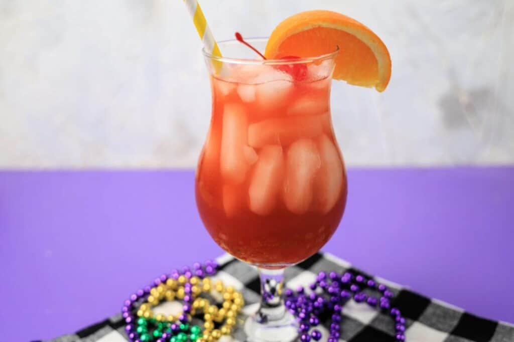 mardi gras drink with a straw