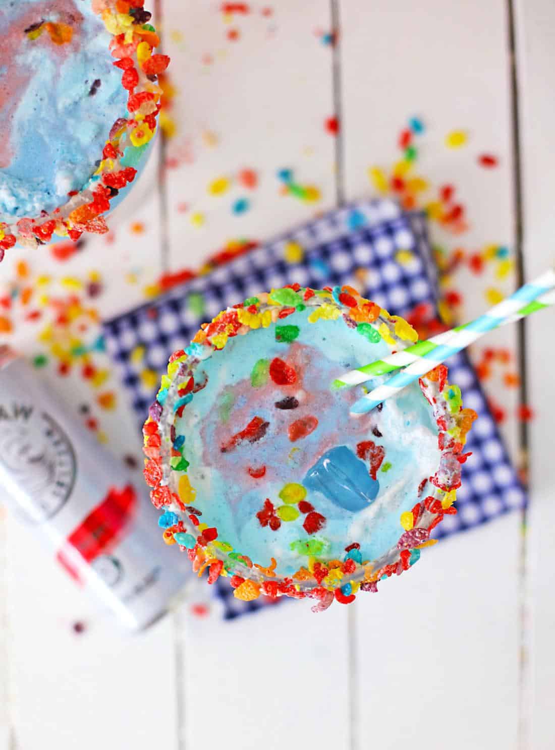Fruity Pebbles Margarita served in glasses, placed on a white table with checkered napkin.