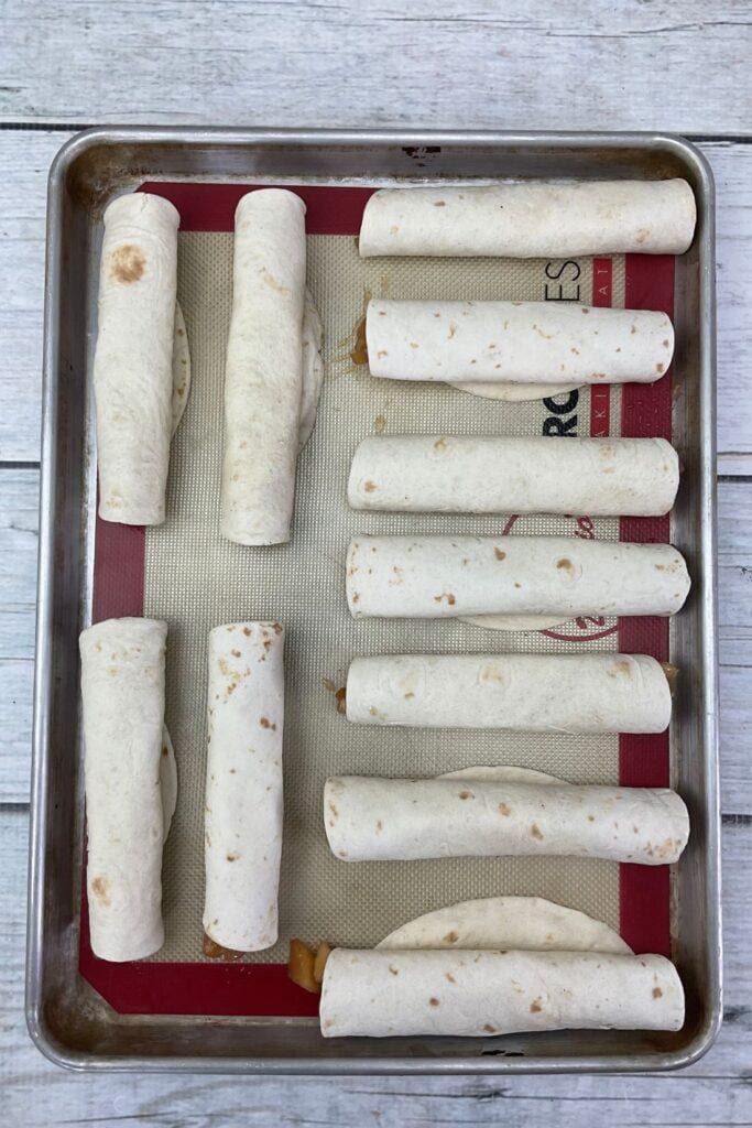 The combination of the warm, fragrant apples, and the crispy pastry creates a mouth-watering sensation that is both comforting and indulgent. The subtle sweetness of the apples is perfectly balanced by the crispy texture of the tortilla shell, creating a perfect harmony of flavor and texture. #applepietaquitos #CincodeMayo #taquitos #applepie