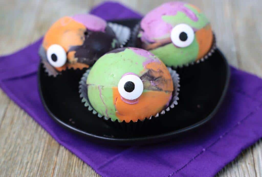 Hocus Pocus Hot Chocolate Bombs: A Recipe for Delight 8 Hocus Pocus Hot Chocolate Bombs on a plate