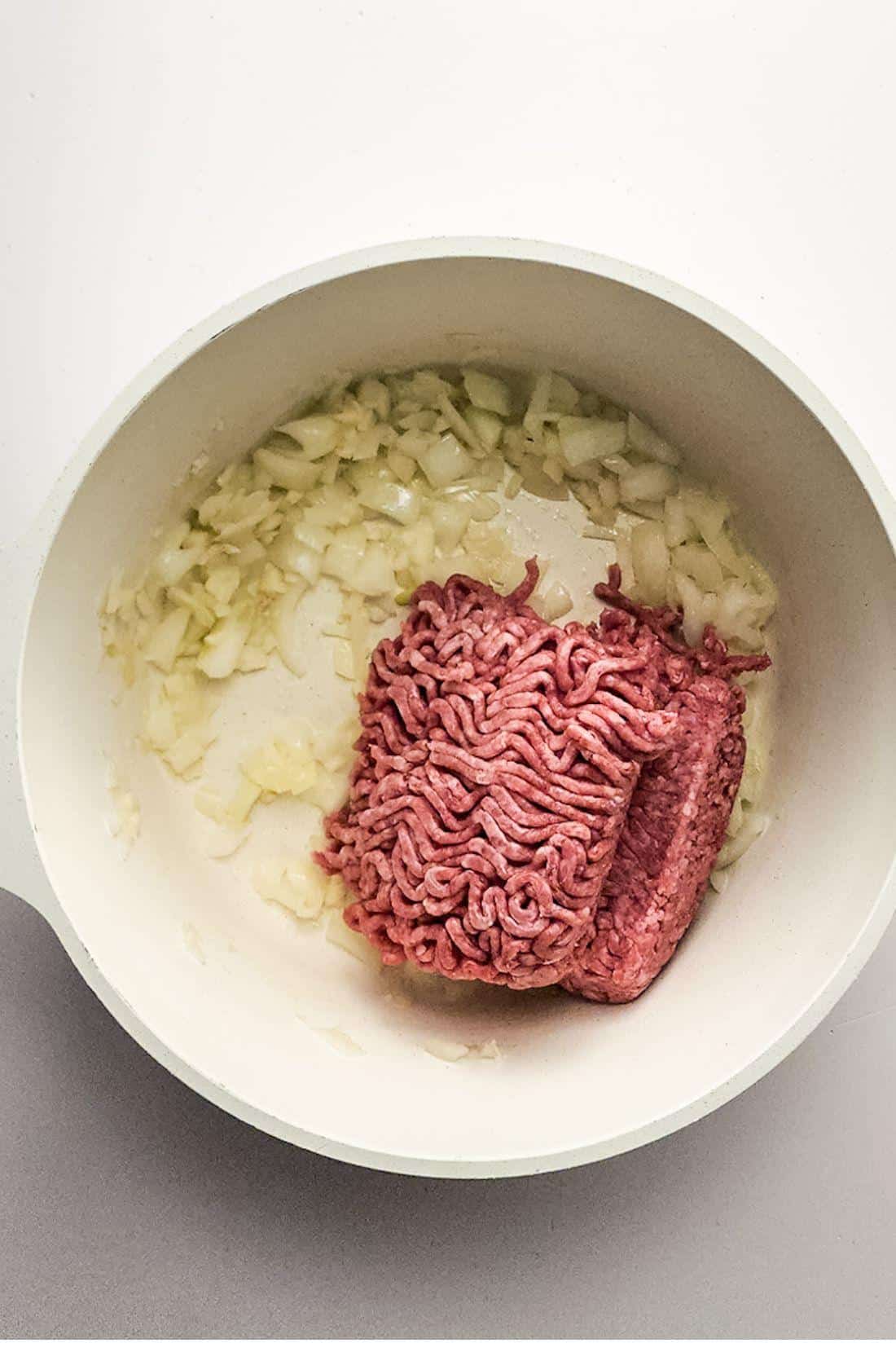 Add Beef to Onion and Garlic