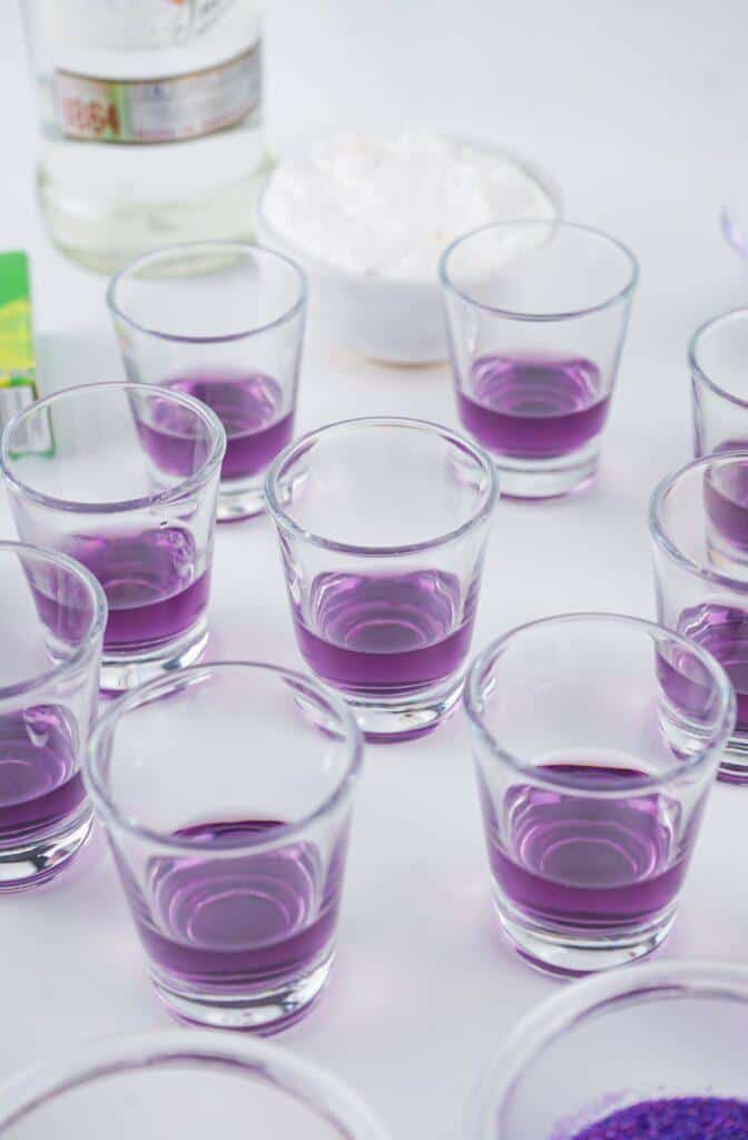 Fill shot glasses with grape jello