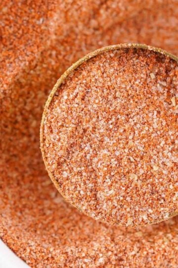 Homemade Tajin Seasoning in bowl with measuring spoon.