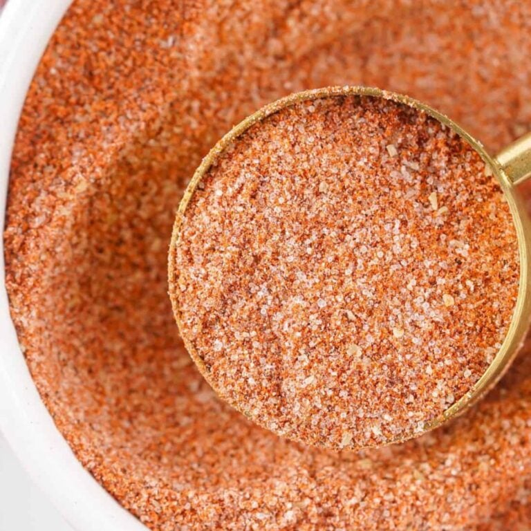 Homemade Tajin Seasoning in bowl with measuring spoon.