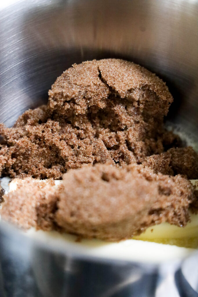 Glitter Valentine's Cracker Candy: A Sweet & Sparkly Treat 5 Brown sugar mounded in a metal bowl, partially mixed with butter, sets the stage for a delightful batch of Valentine's Cracker Candy.