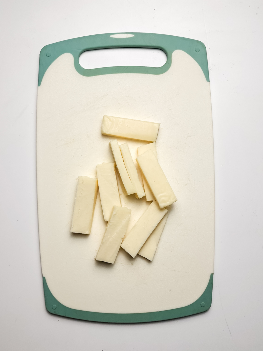mozzarella block, chopped into sticks.