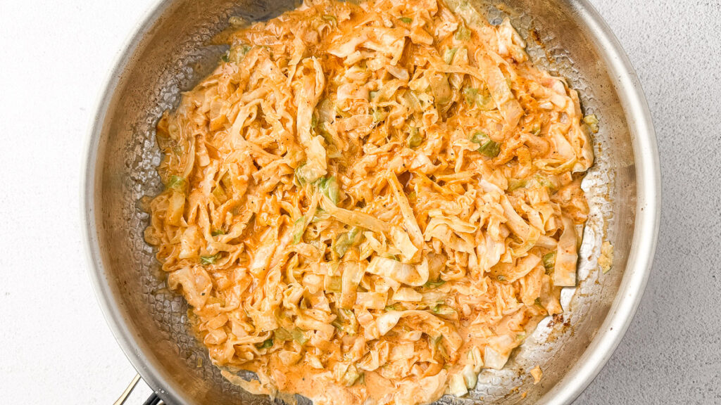 Creamy Cabbage Alfredo with Crispy Chicken Thighs (A Low-Carb Comfort Dinner) 9 creamy cabbage alfredo sauce in titanium pan