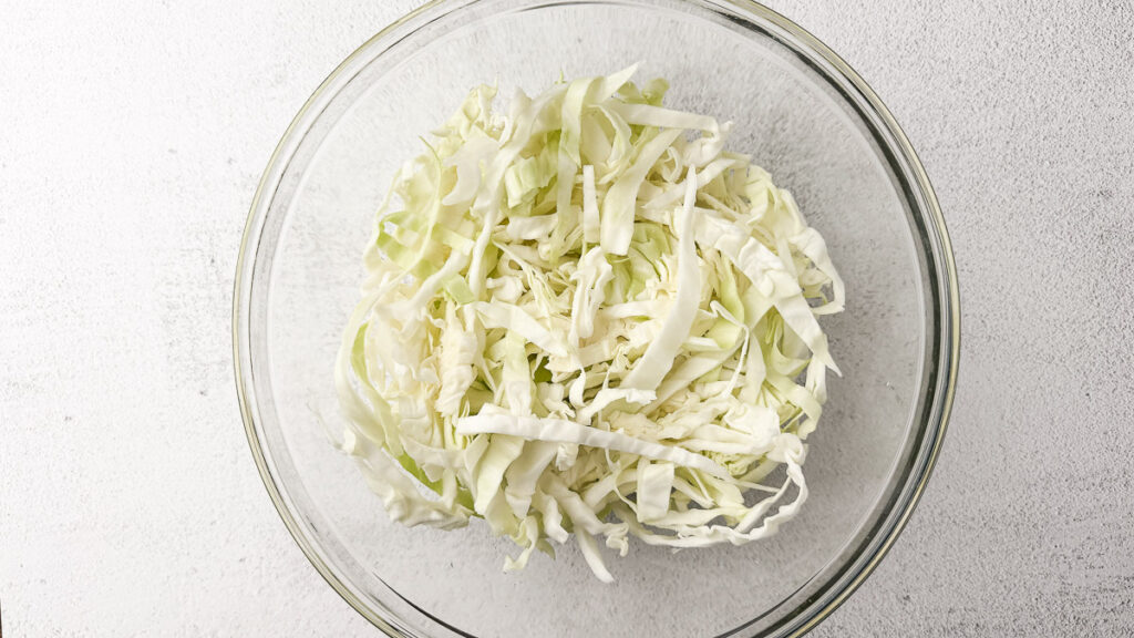 Creamy Cabbage Alfredo with Crispy Chicken Thighs (A Low-Carb Comfort Dinner) 5 a bowl with cabbage
