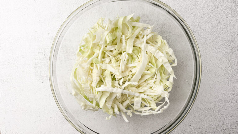 Creamy Cabbage Alfredo with Crispy Chicken Thighs (A Low-Carb Comfort Dinner) 14 a bowl with cabbage