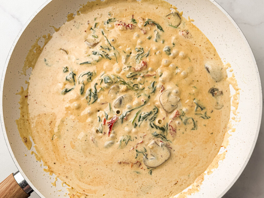 Creamy Tuscan Chicken Step 4 add cream