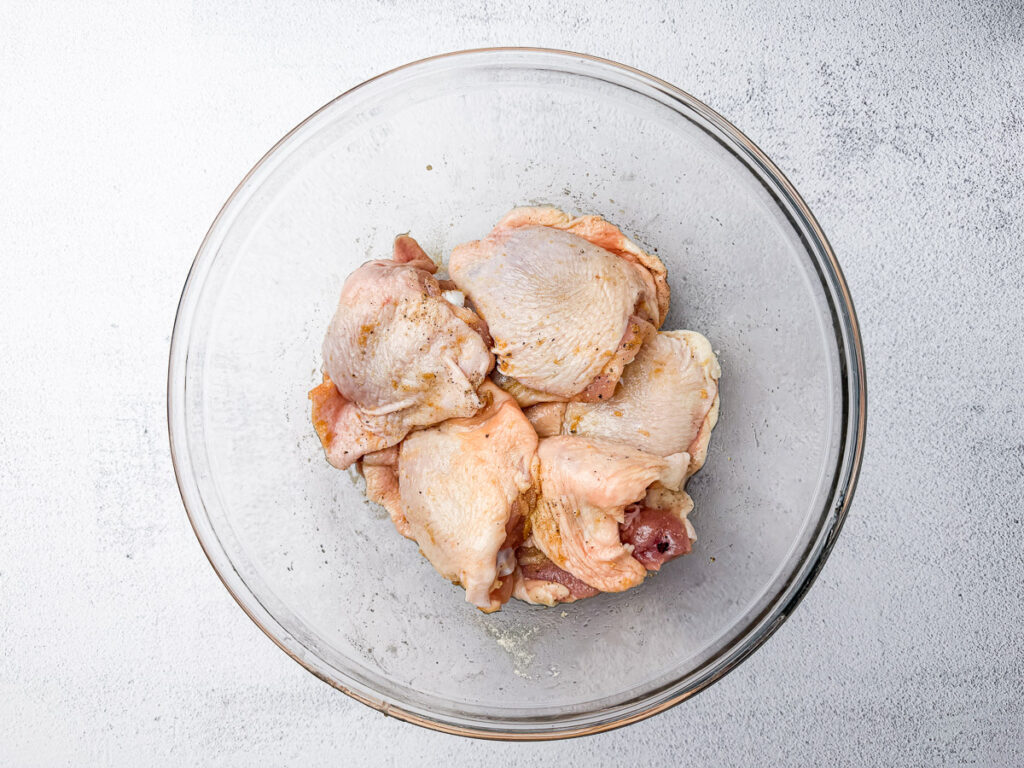 chicken thighs seasoned with onion powder, garlic powder, salt, black pepper