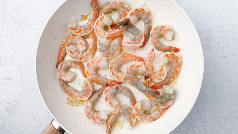 Easy Shrimp and Rice Casserole (Creamy & No Canned Soup!) 13 Seared shrimp with garlic and butter in a large skillet