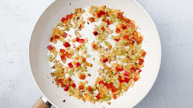 Easy Shrimp and Rice Casserole (Creamy & No Canned Soup!) 14 Sautéed chopped onion, celery and bell pepper in a large skillet.