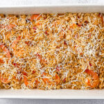shrimp and rice casserole with shredded cheese on top