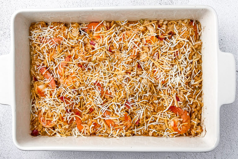 Easy Shrimp and Rice Casserole (Creamy & No Canned Soup!) 17 shrimp and rice casserole with shredded cheese on top