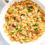 creamy cabbage and kielbasa skillet on table