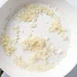 creamy cabbage and kielbasa skillet ingredients - chopped onion