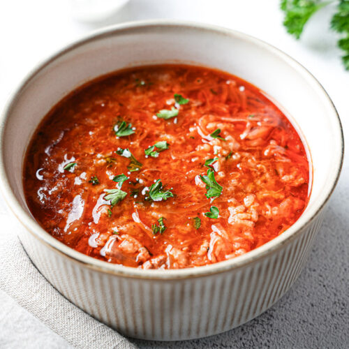 Easy Stuffed Cabbage Soup (1-Pot Deconstructed Golumpki) 14 Deconstructed stuffed cabbage soup with ground beef, cabbage, and rice in a soup bowl