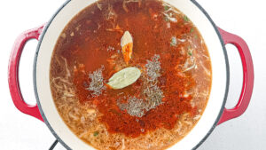 Deconstructed stuffed cabbage soup with ground beef, cabbage, and rice in a Dutch oven