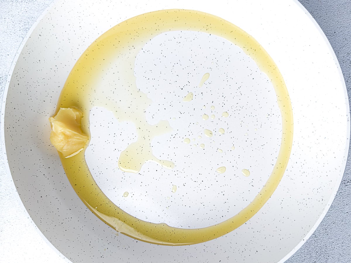 Melting Ghee In A Large Skillet Over Medium High Heat.