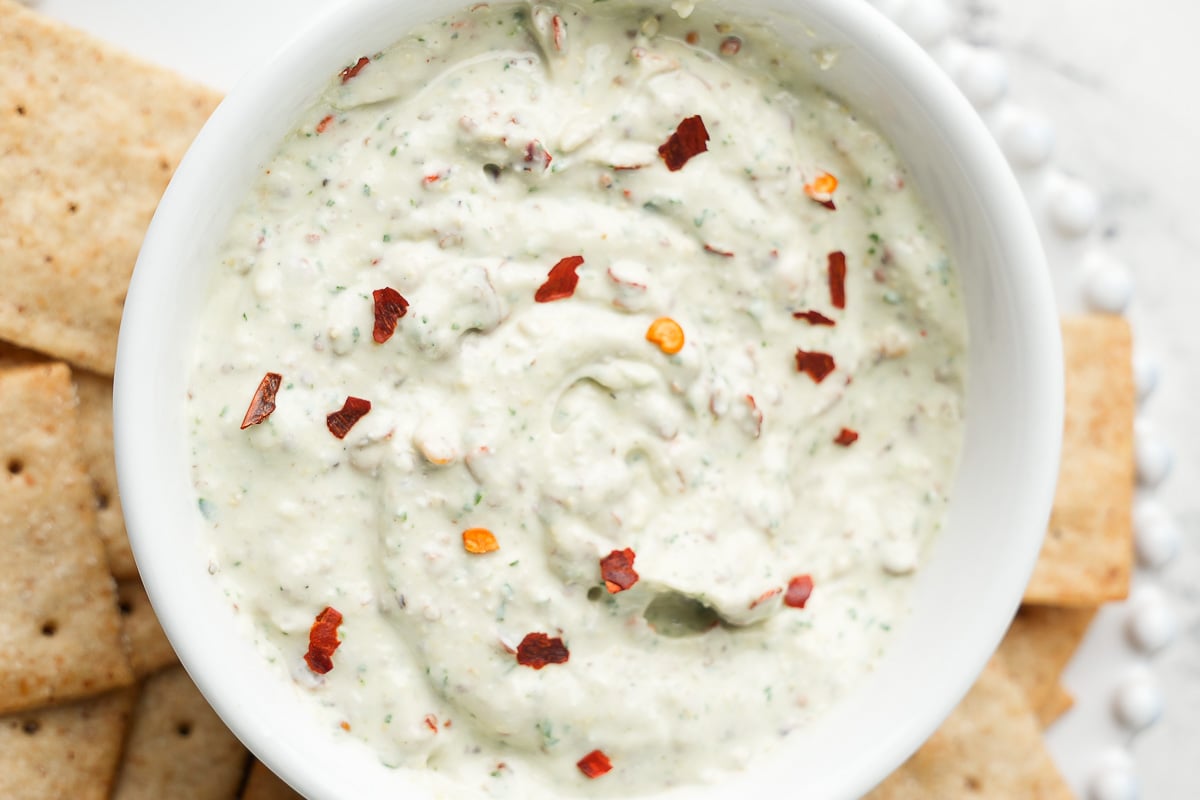 roasted garlic cottage cheese dip in white bowl